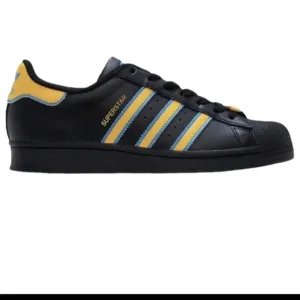 Adidas Superstar Black Sneakers with Yellow and Blue Stripes