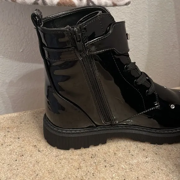 DKNY brand size 5 black zip closure boots- NWT