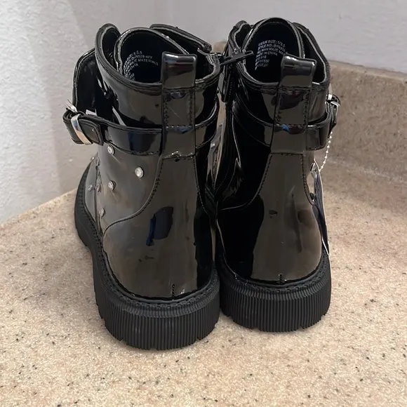 DKNY brand size 5 black zip closure boots- NWT