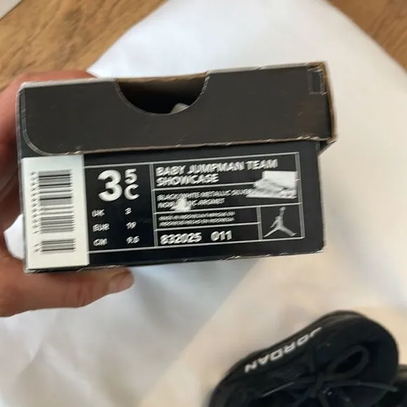 JORDAN BABY JUMPMAN TEAM SHOWCASE SNEAKERS.   BLACK AND WHITE ARE COLORS.