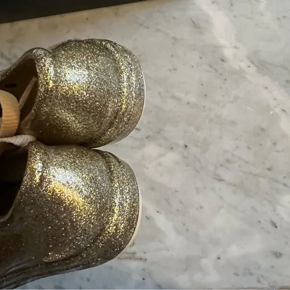 NIB Melissa Gold Glitter Jelly Sneakers.  Size 2