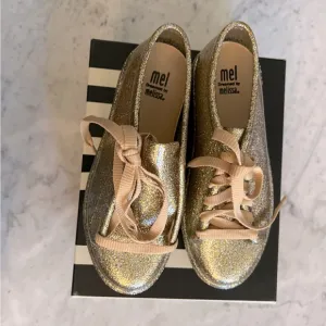 NIB Melissa Gold Glitter Jelly Sneakers.  Size 2