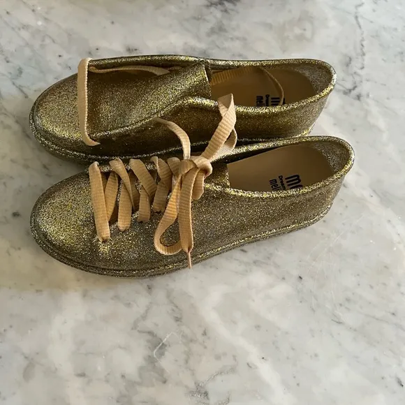 NIB Melissa Gold Glitter Jelly Sneakers.  Size 2