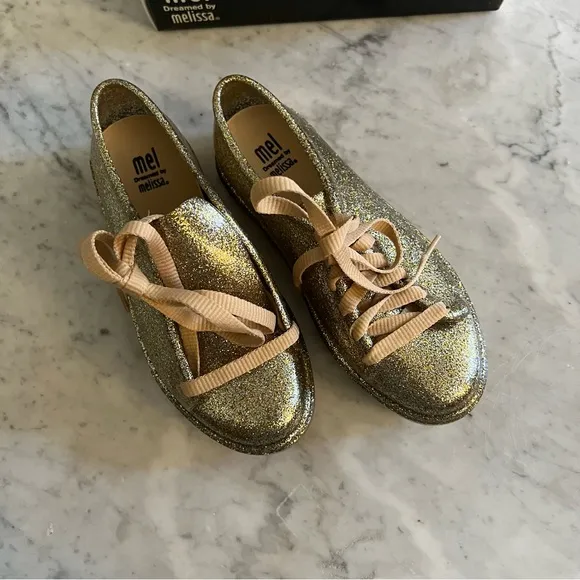 NIB Melissa Gold Glitter Jelly Sneakers.  Size 2