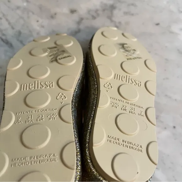 NIB Melissa Gold Glitter Jelly Sneakers.  Size 2