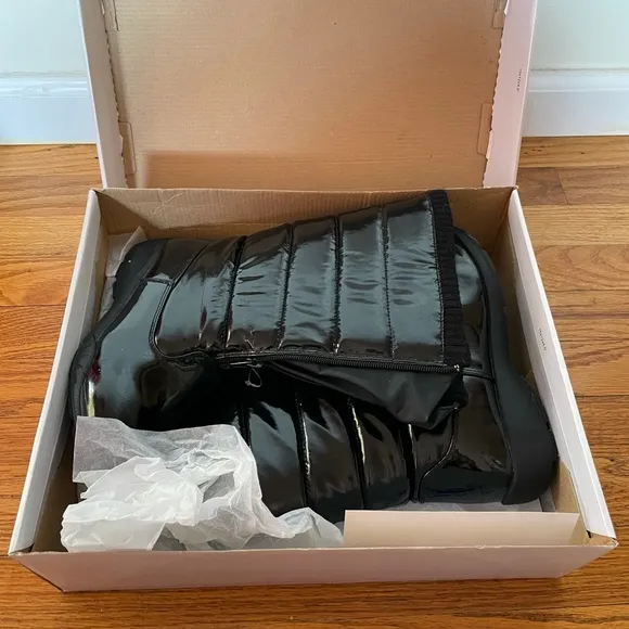 Tundra Black Puffy Boots