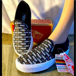 VANS ASHER PRIDE SLIP-ON CANVAS SNEAKERS