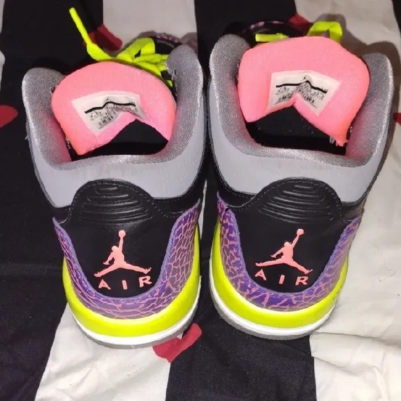 Vibrant Black and Purple Sneakers with Neon Accents