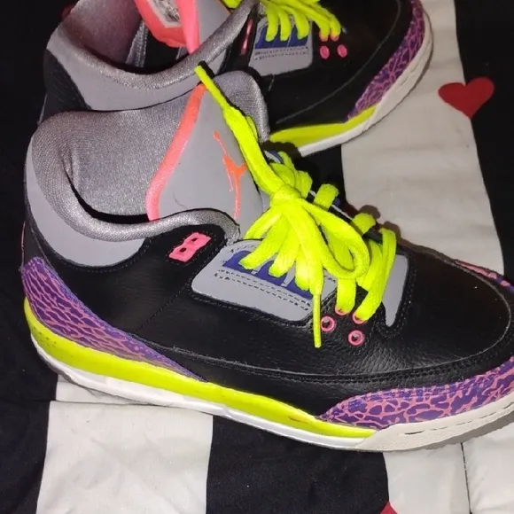 Vibrant Black and Purple Sneakers with Neon Accents